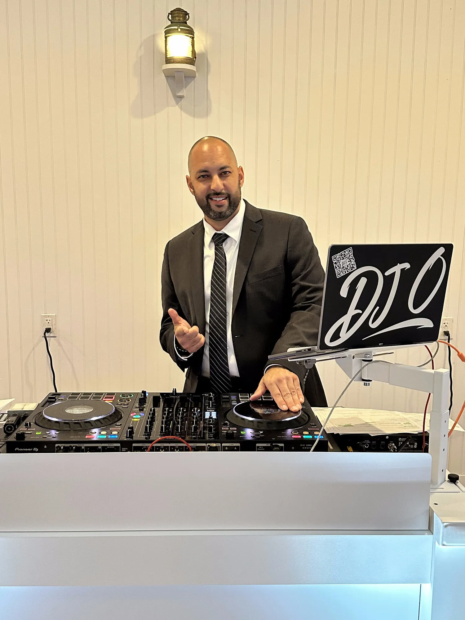 DJ O performing at a wedding reception